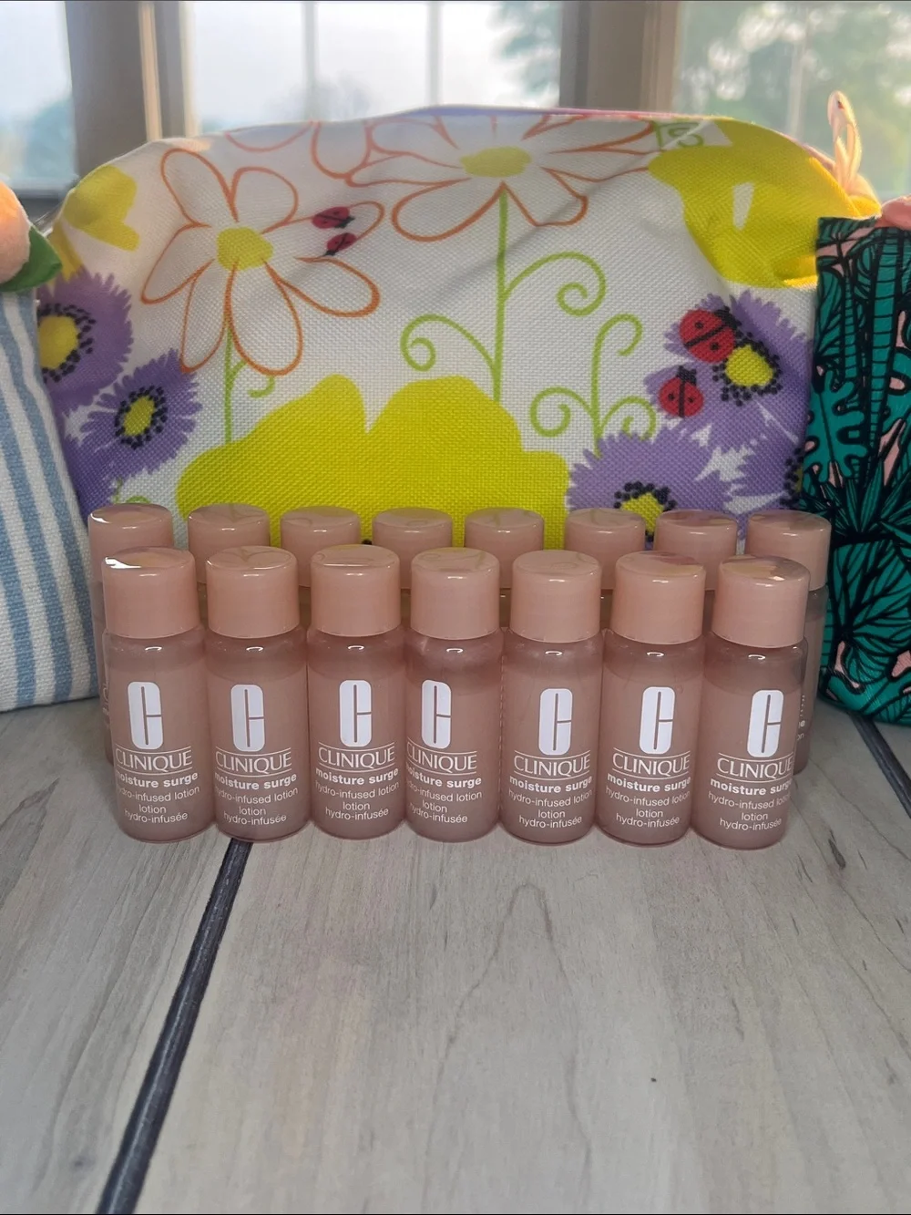 15 pc Clinique Moisture Surge Hydro Infused Mini Lotion Serum Set w Cosmetic Bag